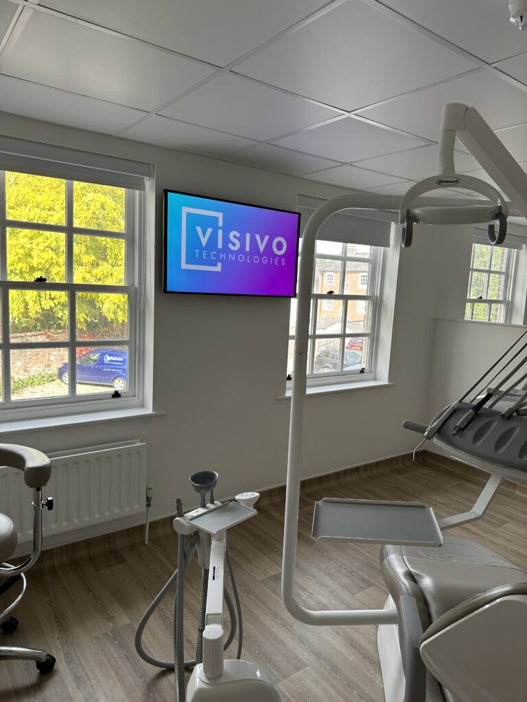 dental room with a digital signage display